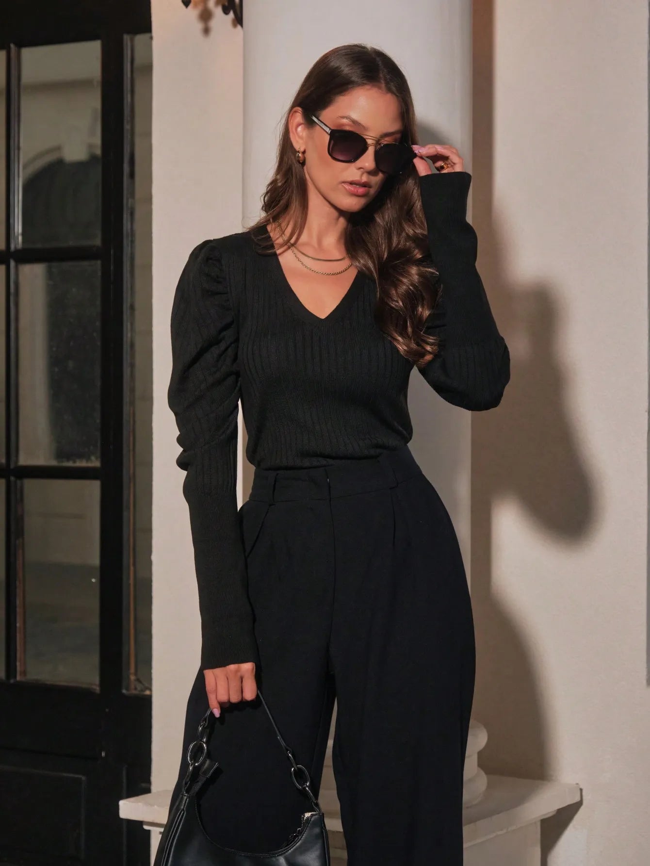 Blusa feminina de tricot canelado decote V com manga bufante