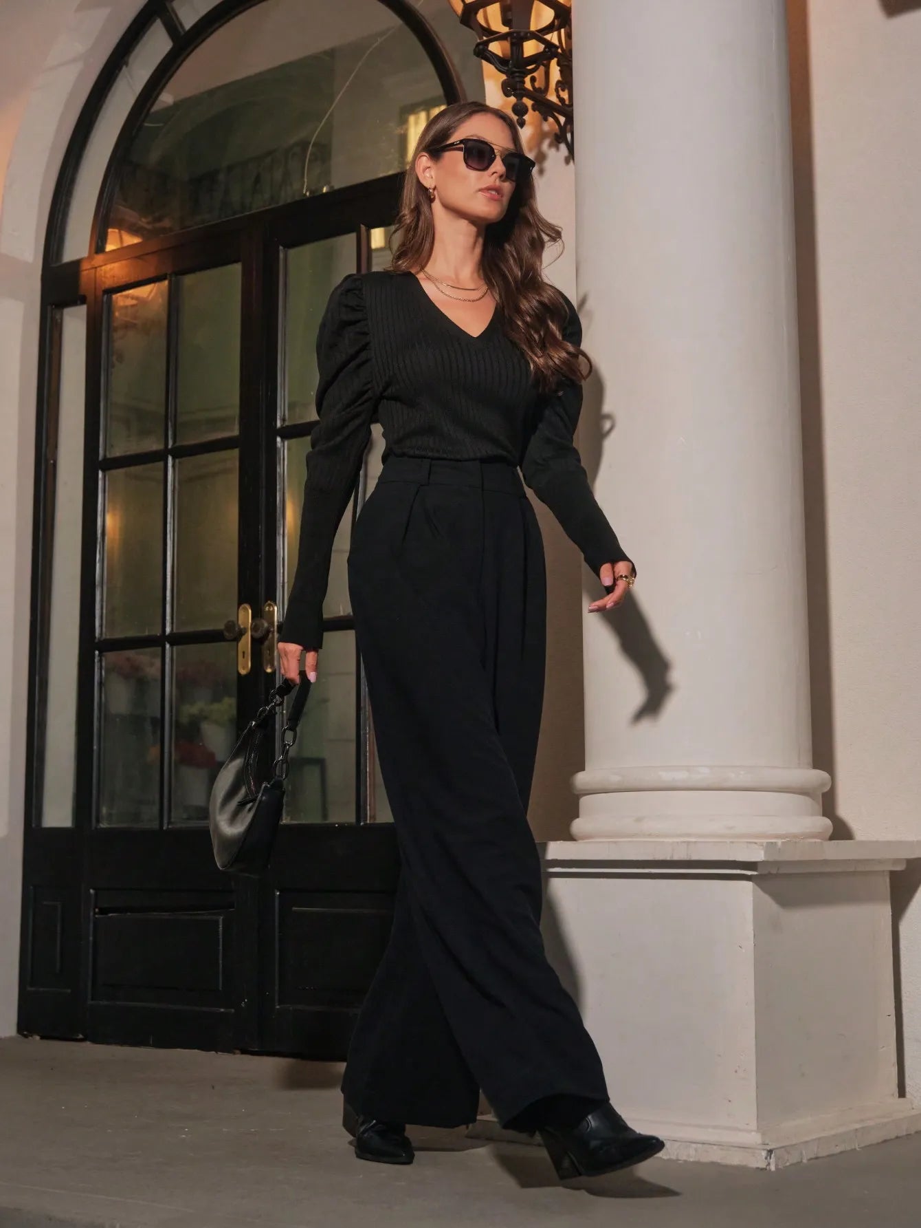 Blusa feminina de tricot canelado decote V com manga bufante